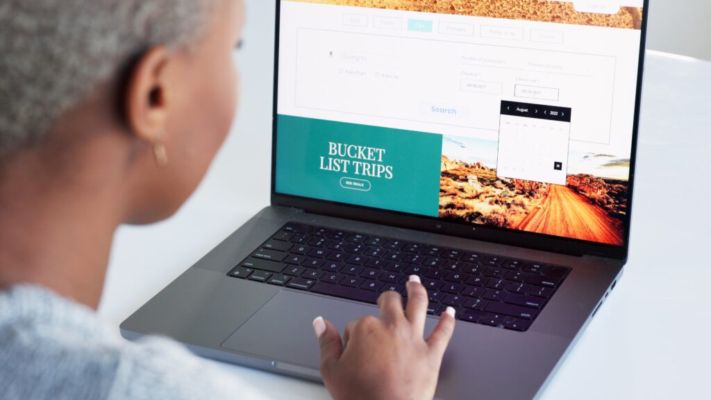 a sleek, modern office workspace is meticulously arranged with a prominent laptop displaying a vibrant wordpress dashboard, surrounded by open notebooks and digital devices, symbolizing the mastery of website optimization and user experience.